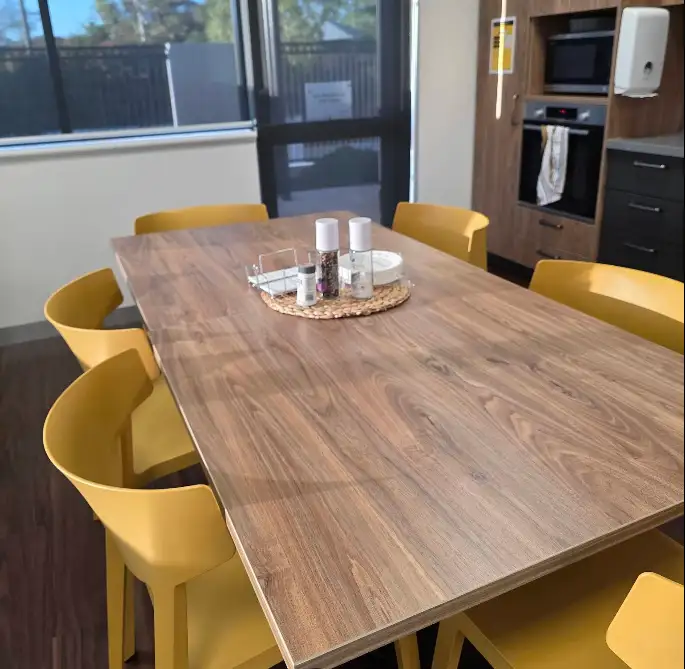 Office breakroom with dining table and chairs